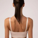 Compressive bra with cups